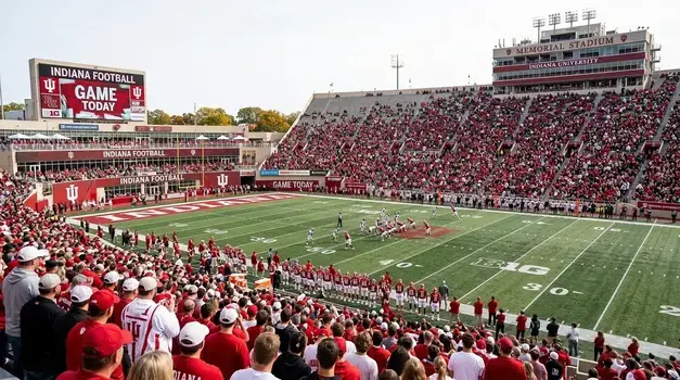 Indiana Hoosiers college football game today at Memorial Stadium with fans cheering in crimson and cream colors.