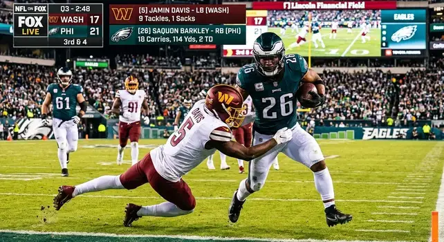 Saquon Barkley running with the football during a Philadelphia Eagles vs. Washington Commanders game, with live match stats overlay.